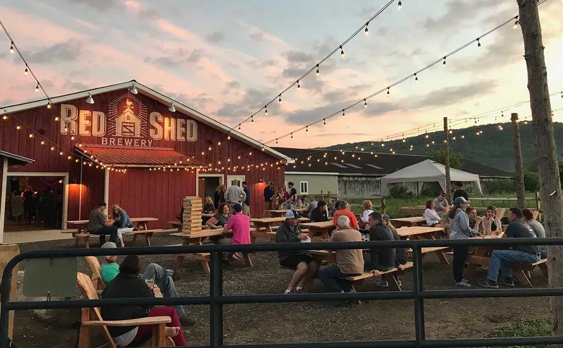 rød skur have' title='Red Shed Brewery er et hit i baseball-elskende Cooperstown
